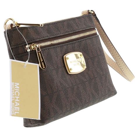 mk jet set large wristlet.